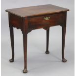A Georgian mahogany lowboy, with moulded edge & rounded corners to the rectangular top above a