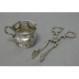 A late 18th century Russian silver vodka cup with eight-sided flared rim, squat round semi-fluted