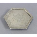 A George III silver teapot stand of hexagonal shape, with engraved borders & monogram in an heraldic