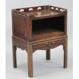 An 18th century mahogany side table, with pierced tray-top gallery above an open recess with a
