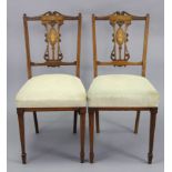 A pair of Victorian rosewood bedroom chairs with inlaid, carved, & pierced splat backs, padded seats