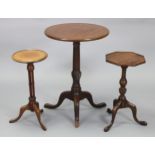 A Georgian mahogany tripod table with later circular top, on vase-turned column & three cabriole