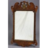 An 18th century-style rectangular wall mirror in walnut veneered frame with gilt Prince-of-Wales