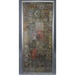 An Asian embroidered textile with gold & silver thread abstract decoration, in glazed frame; 23” x