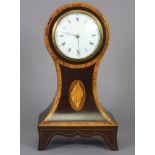 A late 19th/early 20th century mantel timepiece, the 3¼” white enamel convex dial with black roman