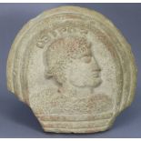An Ancient carved sandstone relief portrait roundel depicting a male bust in profile; 15” x 15½”.