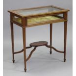 An Edwardian inlaid mahogany bijouterie table with old gold velour-lined interior, on square tapered
