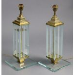 A pair of 20th century Italian brass table lamps on partially-frosted glass rectangular columns &