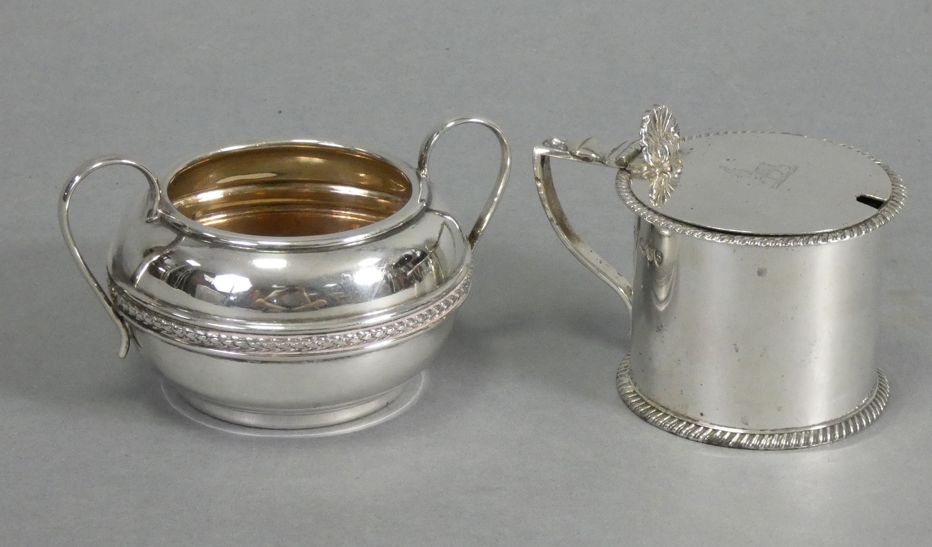 A Victorian silver drum mustard pot in the late 18th century style, the slightly domed hinged lid