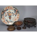 An 18th century Japanese Imari 12” shallow dish with floral decoration (riveted); together with a