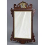 A late 18th century rectangular wall mirror in mahogany veneered frame, with gilt ho-ho bird, fret-