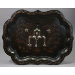 An early Victorian black papier-mache large rectangular tray, with wide cut-card edge & gilt