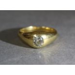 An 18ct. gold ring, gypsy-set with single diamond weighting approx. 0.75 carat; size: S, weight: 7