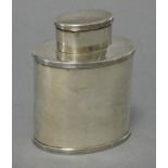 A late Victorian silver tea caddy of plain oval straight-sided form, with pull-off cover, 3¾”