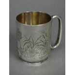 A Victorian silver half-pint mug of straight-sided form with engraved decoration of wading birds
