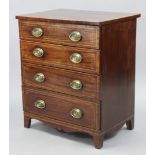 A 19th century inlaid mahogany small chest with rectangular top, fitted four long graduated