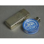 A Victorian silver rectangular engine-turned snuff box with scroll thumb-catch to the hinged lid,