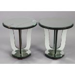 A pair of Art Deco mirrored glass & ebonised occasional tables, each with bevelled edge to the