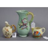 A Royal Worcester porcelain jug of blush ground & with bright-coloured floral decoration, 5¼”