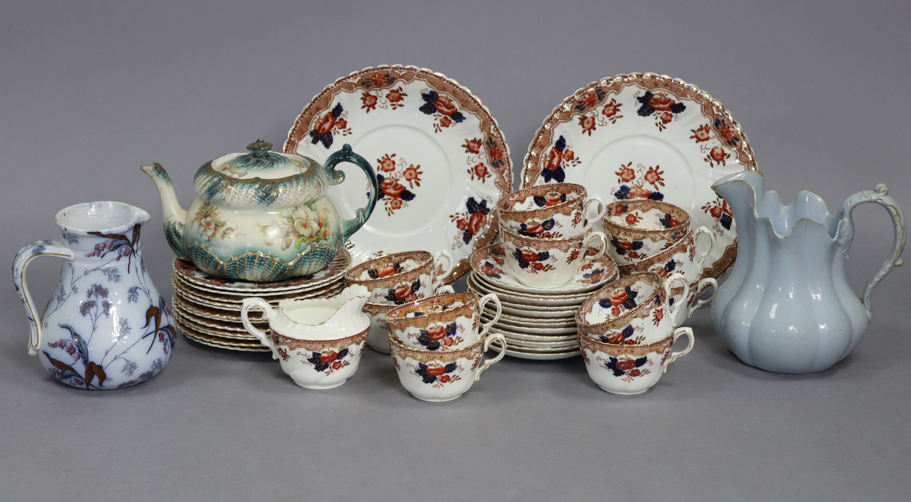 A late Victorian china floral decorated forty-piece tea service (settings for twelve), part w.a.