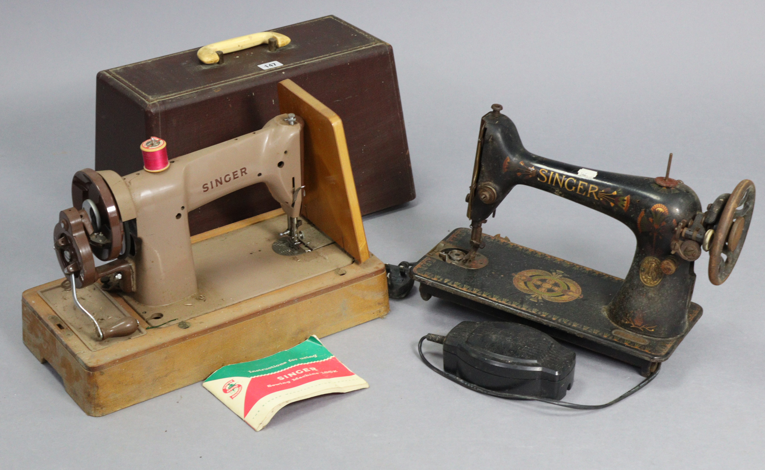 Two Singer sewing machines, one with case; together with various decorative ornaments, etc.