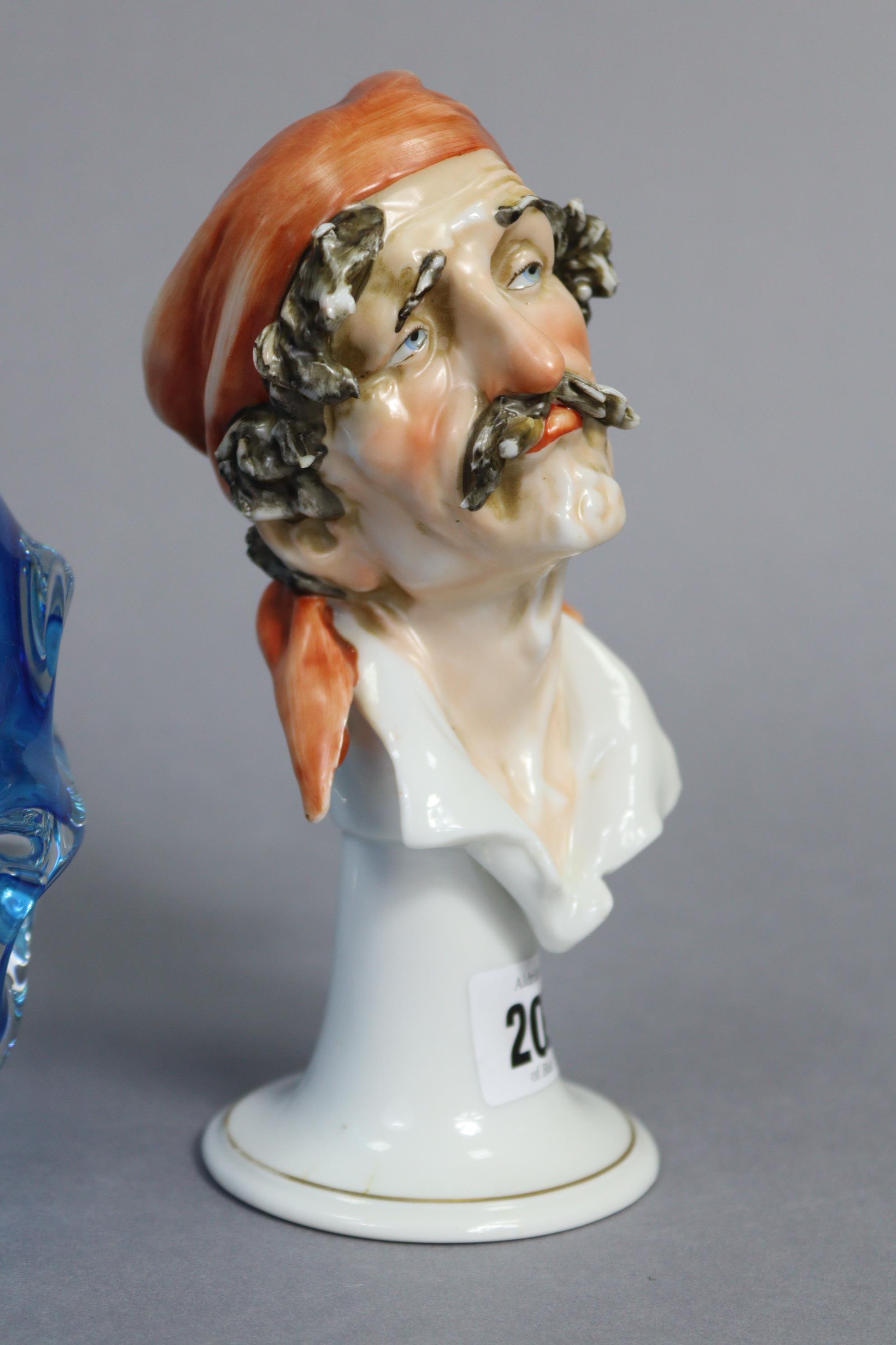 A continental porcelain ornament in the form of a male bust wearing a headscarf & puffing on a - Image 2 of 7