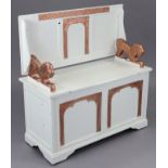 A white painted wooden monk’s bench with fold-over top, hinged box-seat, & on bracket feet, 37½”