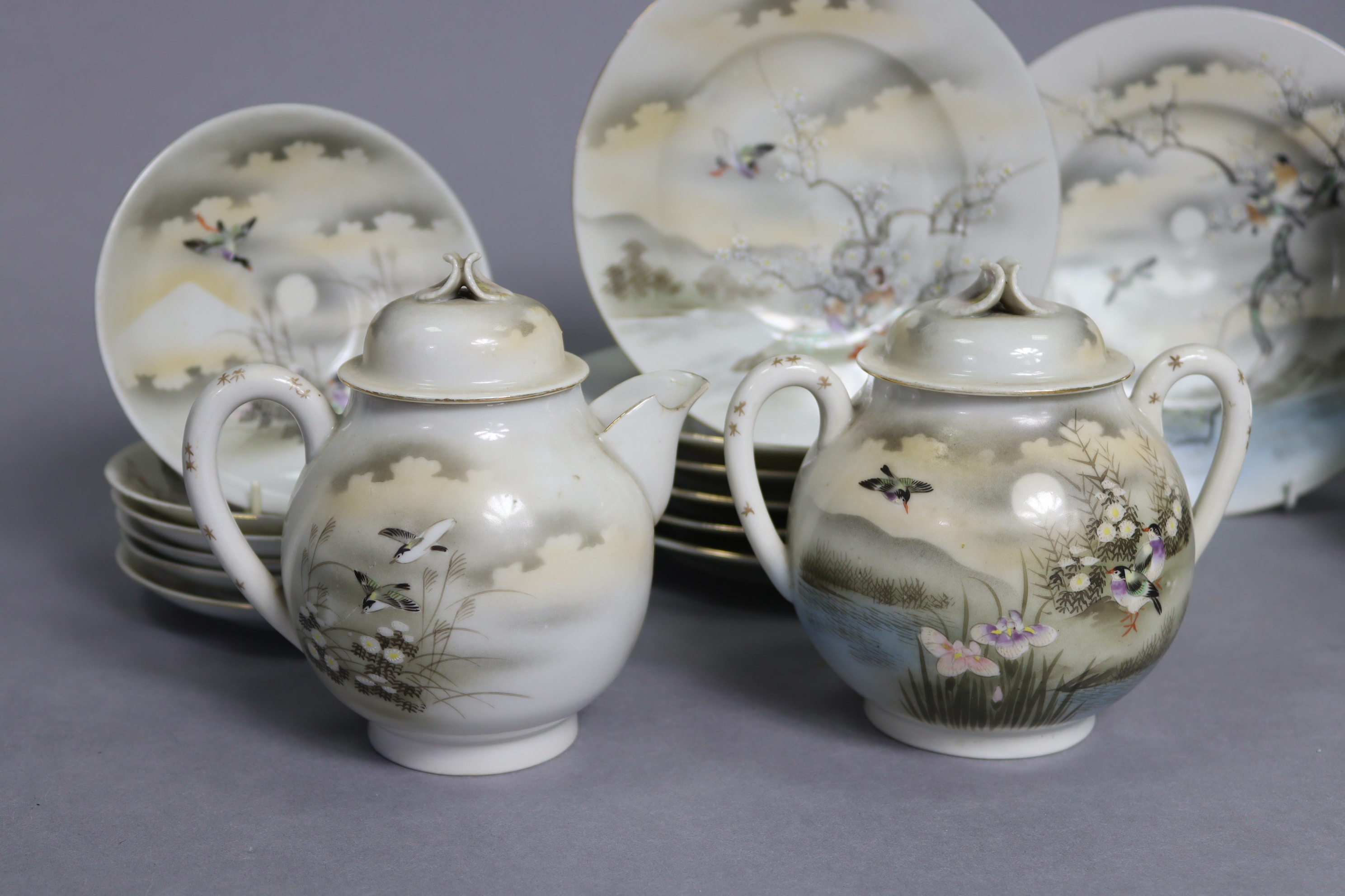 A Japanese egg-shell twenty-eight piece part tea service of white ground, & with multi-coloured - Image 7 of 12