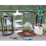 A white-finish aluminium watering can; a garden wall-mounted shelf-unit; various garden tools, etc.