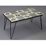 A 1960’s wrought-iron frame low coffee table inset tiles to the rectangular top, 30” wide x 15½”