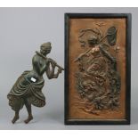 A bronzed metal plaque depicting Diana the Huntress, 19¾” x 11”, framed; & a cast-iron ornament