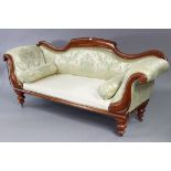A Victorian mahogany-frame three-seater scroll-end settee with shaped back, (requires reupholstery),