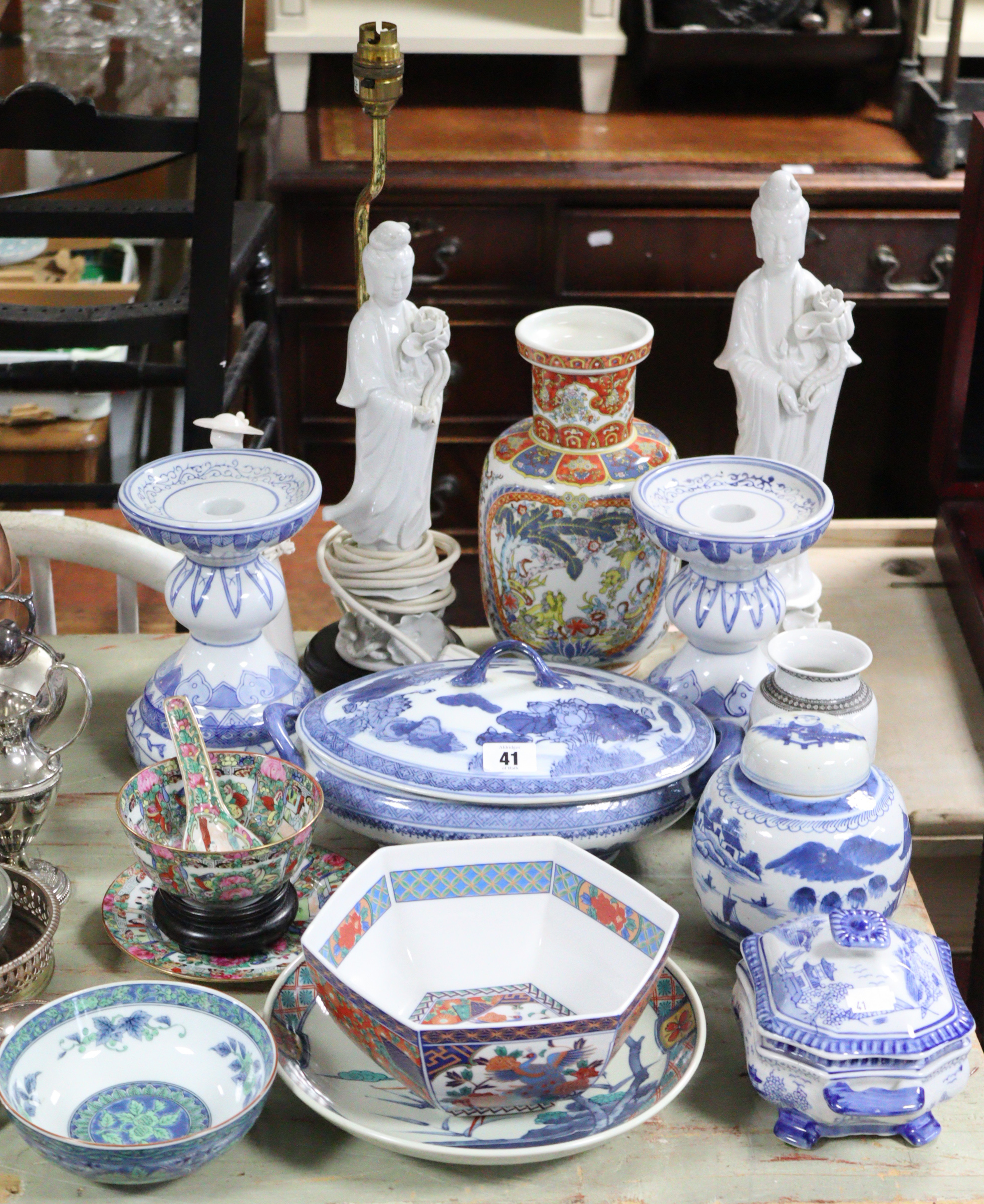 A Chinese pottery oval two-handled vegetable tureen with blue & white floral decoration, 10” wide; a