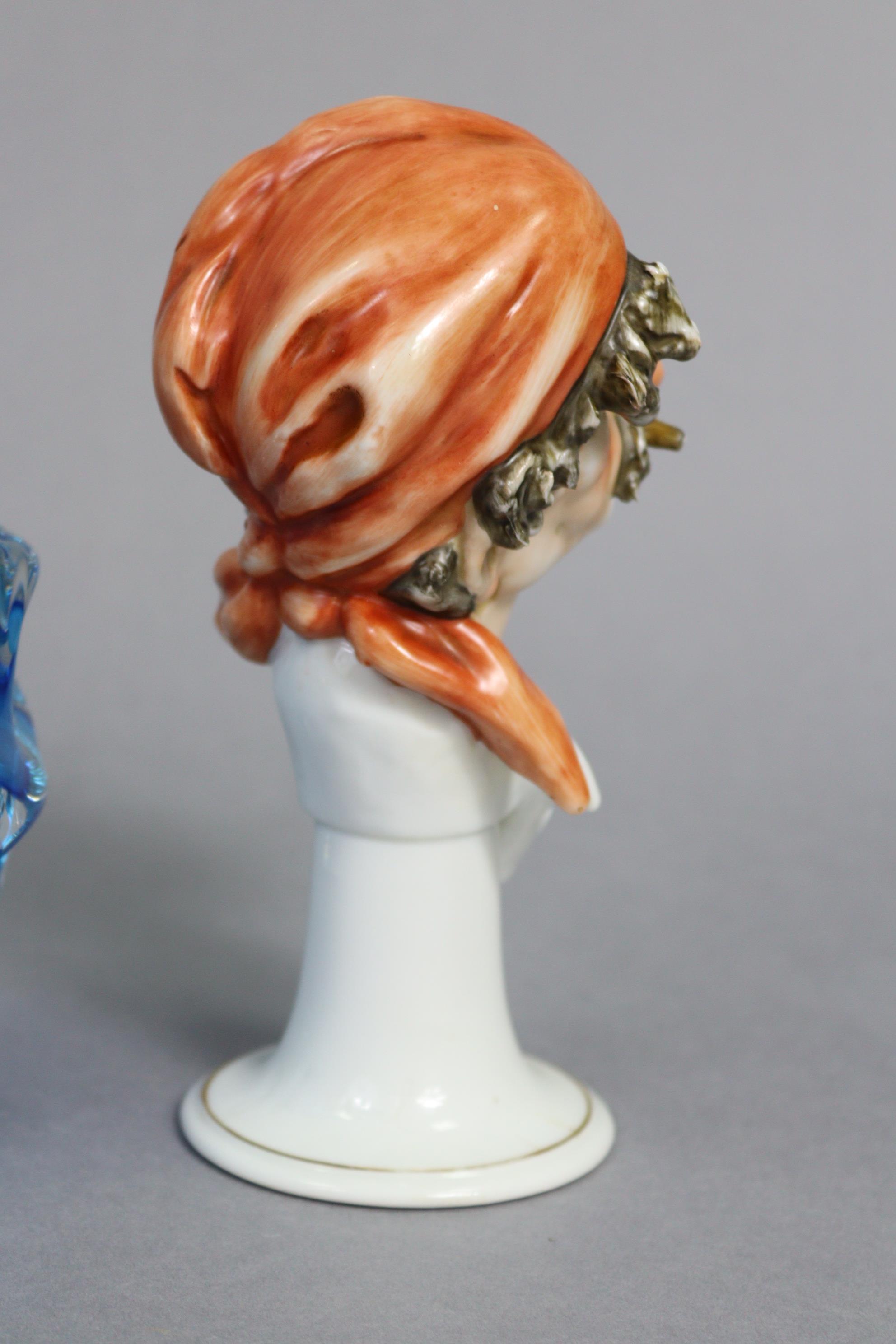 A continental porcelain ornament in the form of a male bust wearing a headscarf & puffing on a - Image 5 of 7