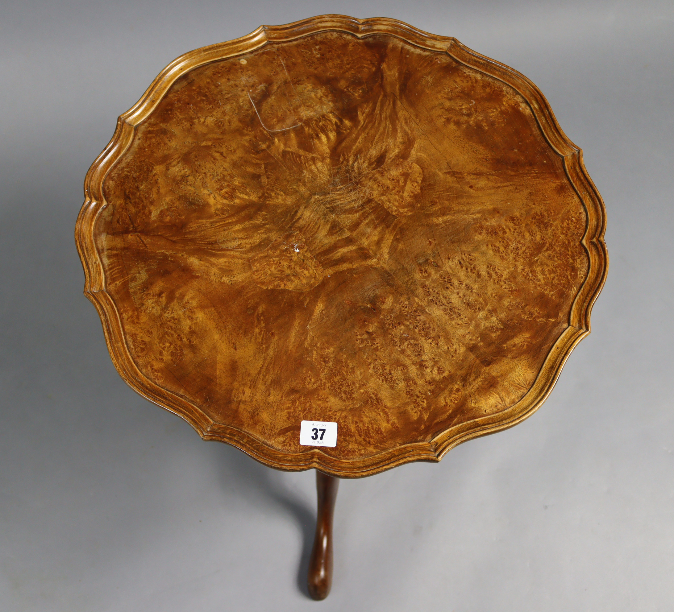 A reproduction walnut tripod table with moulded pie-crust edge to the circular top, & on vase-turned - Image 2 of 2