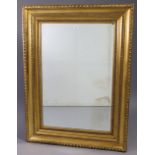 A 19th century-style large gilt frame rectangular wall mirror with gadrooned edge, & inset