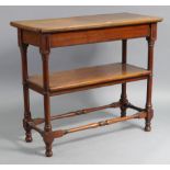 A late 19th century mahogany two-tier side table on four turned legs & turned feet with turned