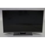 A Mitchell & Brown 42” HDMI television (lacking remote control), w.o.