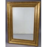 Another 19th century-style large gilt frame rectangular wall mirror with gadrooned edge, & inset