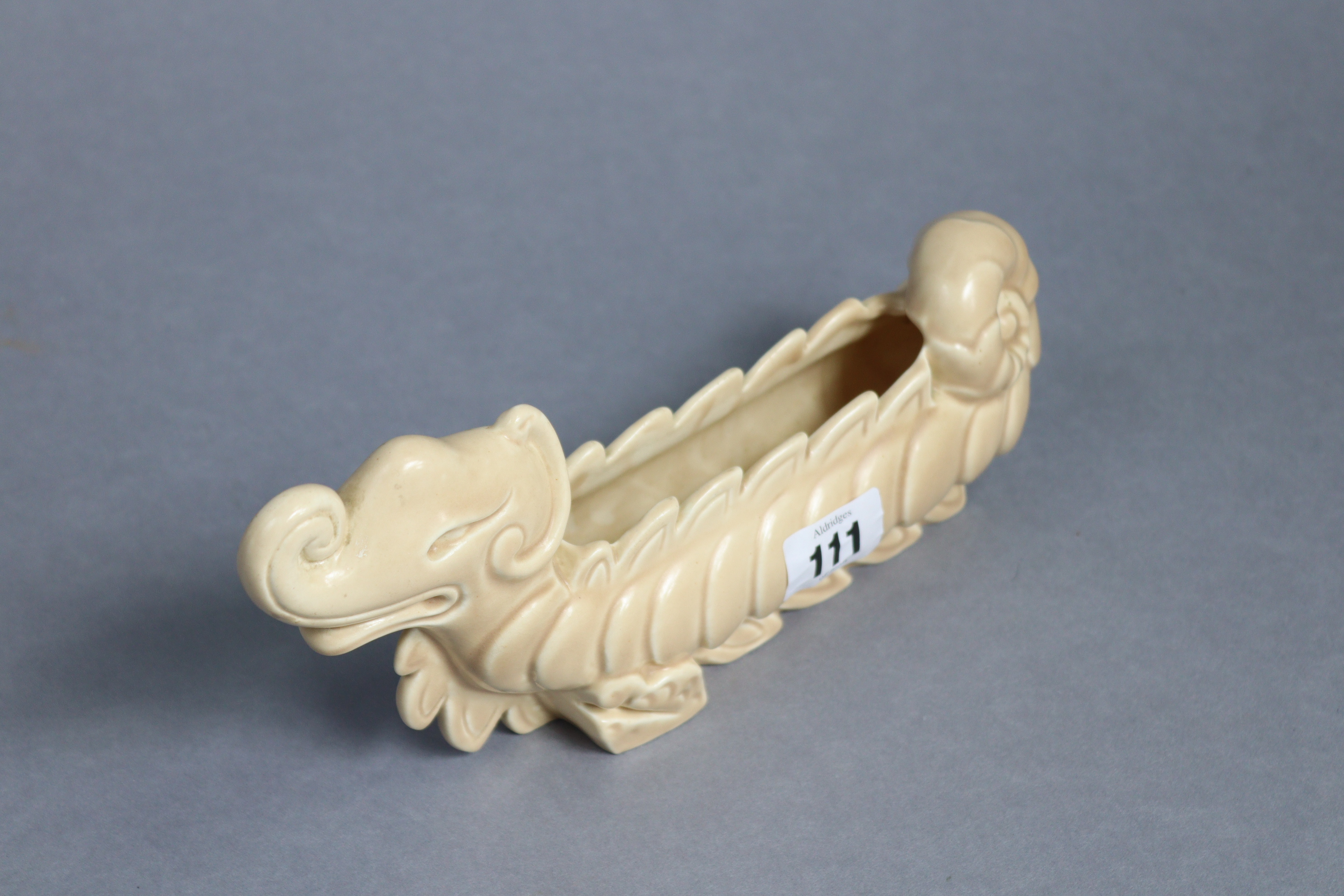 A Clarice Cliff pottery fawn glazed novelty flower trough in the form of a dragon (No. 827), 9½” - Image 2 of 4