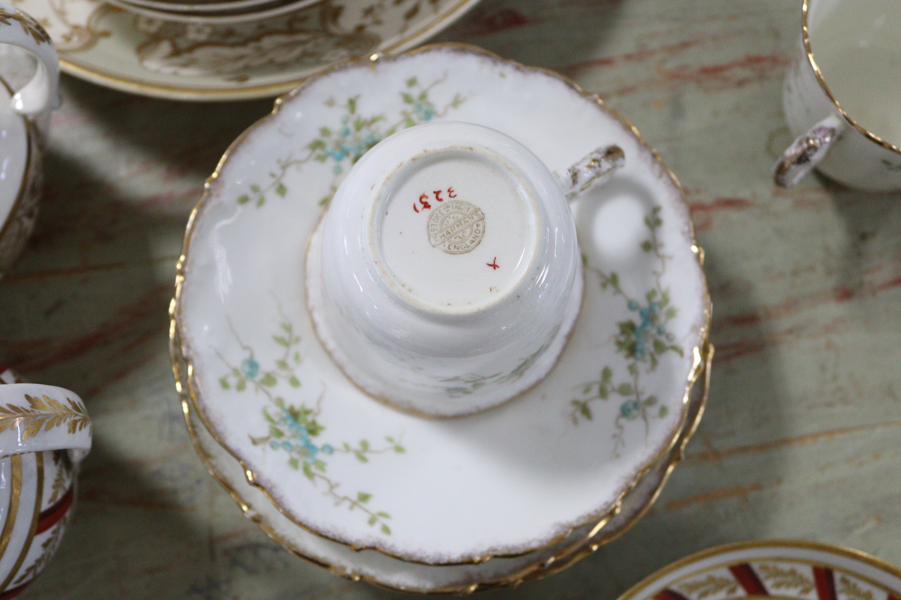 A Victorian floral decorated seven-piece part tea service; a Wedgwood bone china “Gold Chelsea” - Image 7 of 7