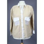 A Vintage Mary Quant ladies’ blouse of cream ground with white trimmings (size 16).