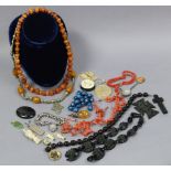 A simulated amber necklace, 25” long; a modern silver ingot; & various items of Victorian & later