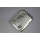 A George V silver pocket cigarette case with crest of Sedbergh School to the hinged lid, 3¼” x