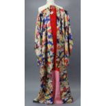 An early-mid 20th century Japanese kimono with all-over floral decoration on a blue ground, with red