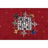 A large sequin-decorated shawl of crimson ground, 76” x 45”; & three various other shawls.