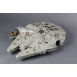 A Kenner Products ? large Star Wars model Millennium Falcon”, 31½” long, unboxed.