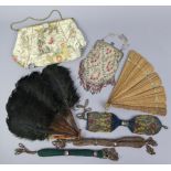 Three Victorian beadwork purses; together with two other purses; & two fans.
