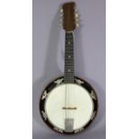 A Vintage eight-string banjo, 23¼” long, with case.