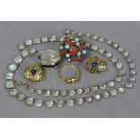 A .925 standard necklace set with small moonstones (in two pieces – 9” & 7” long); a ditto cluster